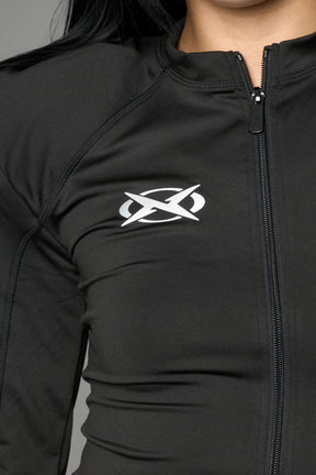 Namilia Pagoda Top in black with sharp padded shoulders and zip front