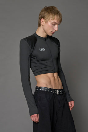 Namilia Pagoda Top in black with sharp padded shoulders and zip front