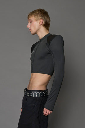 Namilia Pagoda Top in black with sharp padded shoulders and zip front