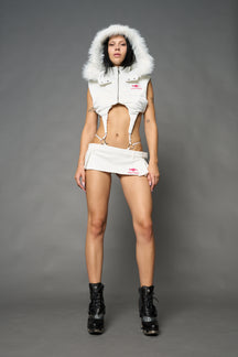 White Namilia cropped puffer vest with faux-fur hood, embroidered logo and detachable string body harness with ring details.