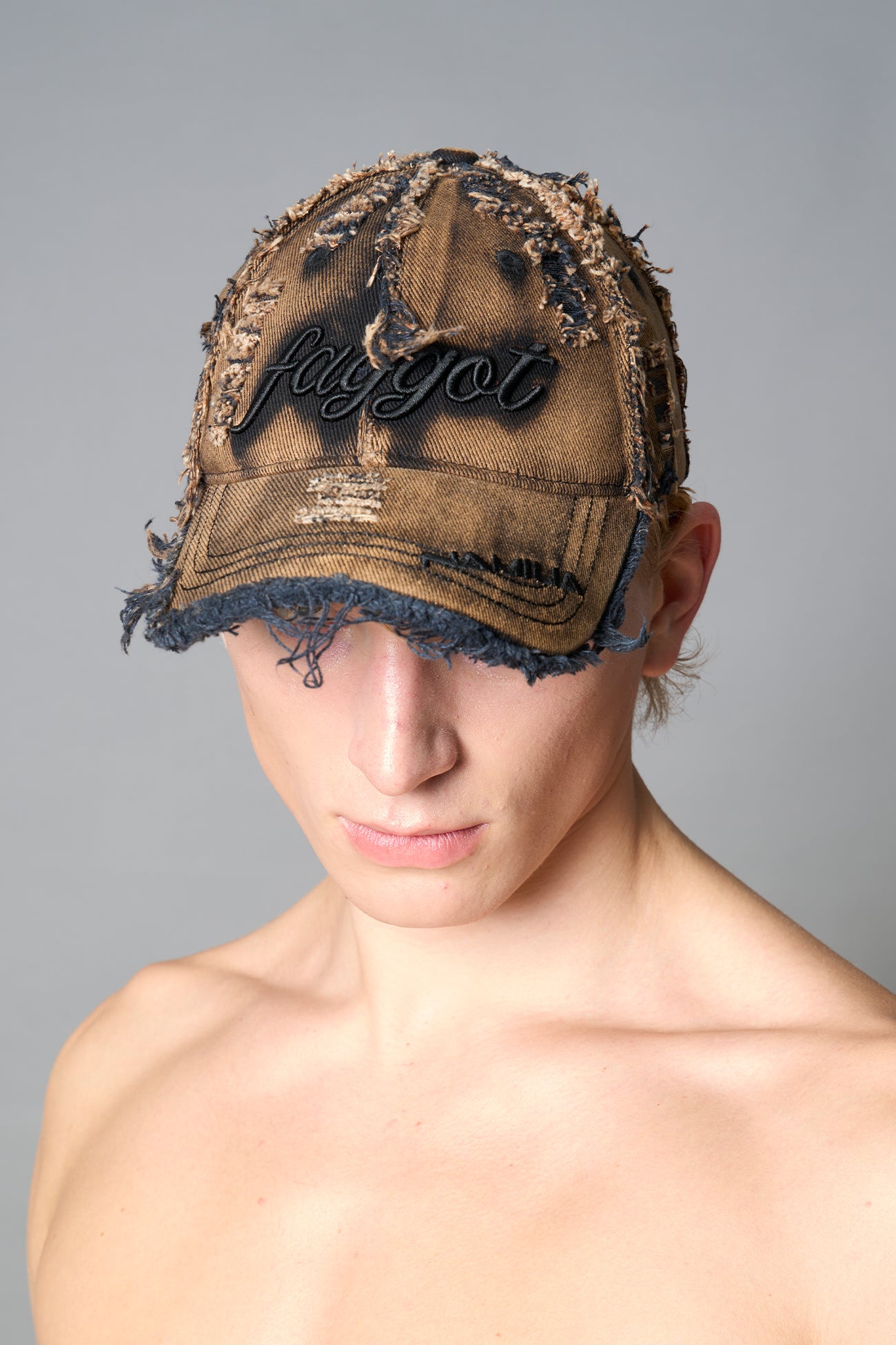 black washed cap with embroidery and snap closure