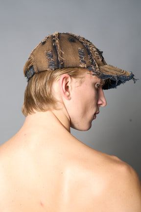 black washed cap with embroidery and snap closure