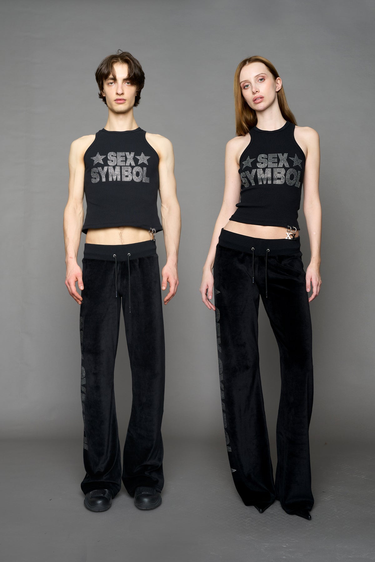 model wearing black x symbol crystal tank top in cotton rib