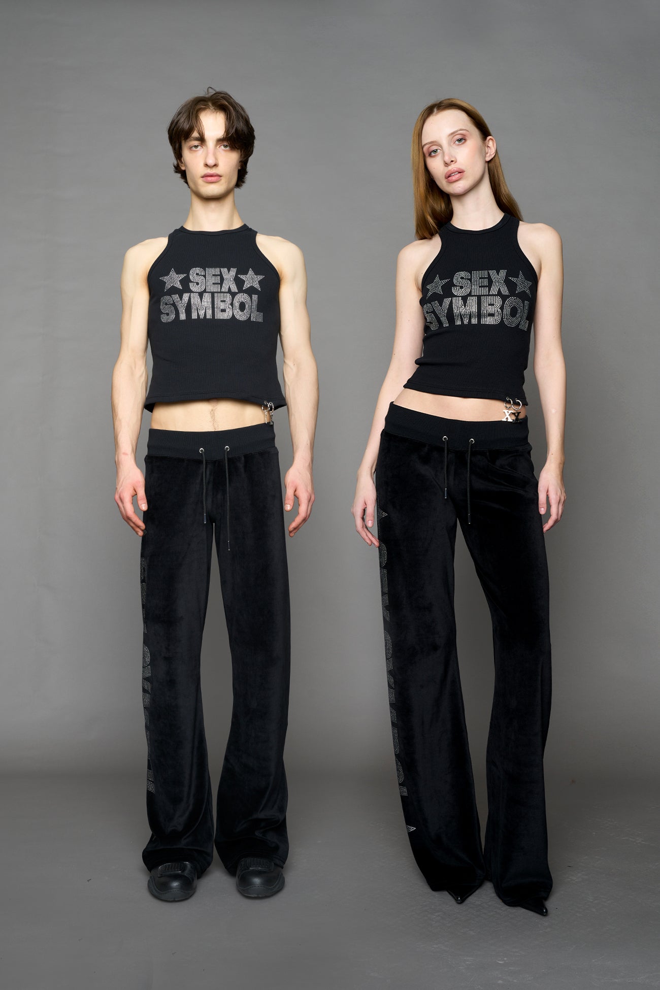 model wearing black x symbol crystal tank top in cotton rib