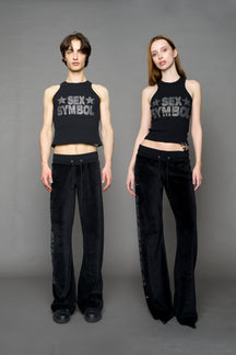 model wearing black x symbol crystal tank top in cotton rib