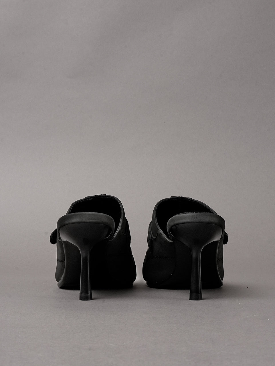 Black vegan leather high heel tabi mules with sneaker details