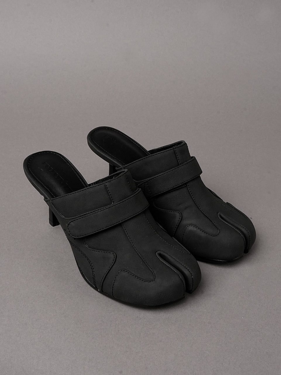 Black vegan leather high heel tabi mules with sneaker details