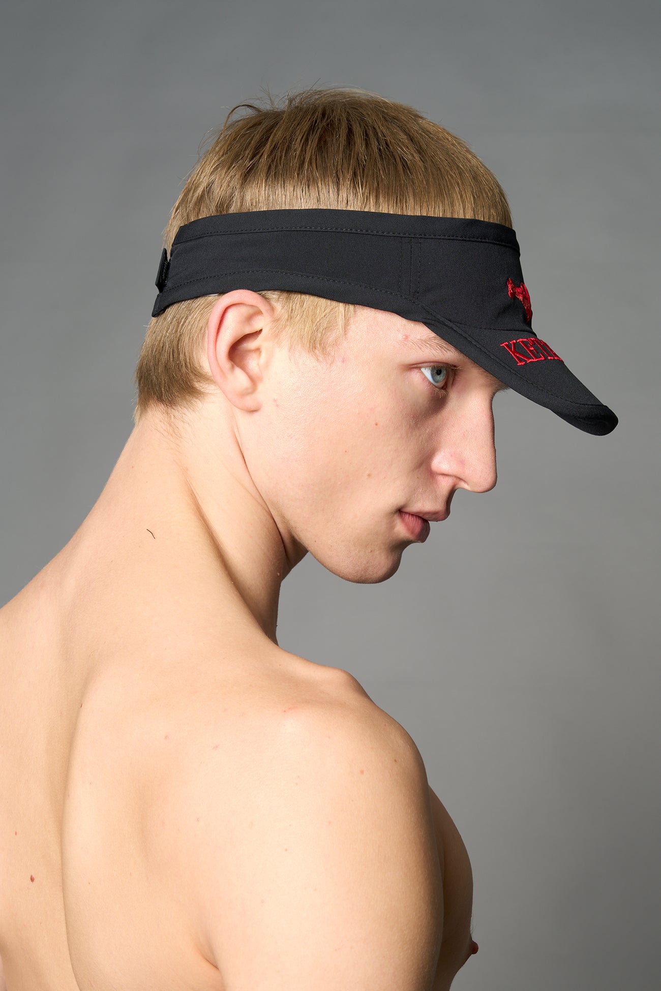 Black Namilia visor hat with embroidered horse and bold lettering on brim, unisex streetwear accessory