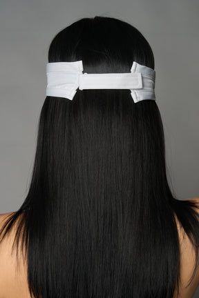 White Namilia visor hat with embroidered horse and bold lettering on brim, unisex streetwear accessory
