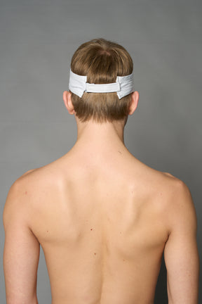 White Namilia visor hat with embroidered horse and bold lettering on brim, unisex streetwear accessory