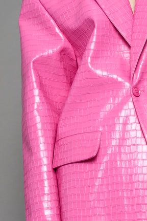 model wearing pink vegan croc leather long blazer coat 