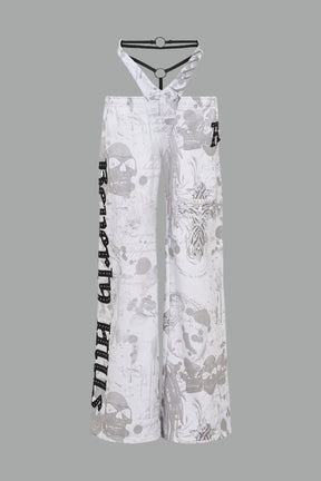 low-rise white wide-leg pants featuring a V-shaped waistband and detachable thong strap detail.